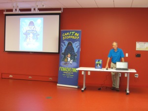 It's showtime! Ron about to read FRANKENSTINK! Garbage Gone Bad at Halifax Central Library.